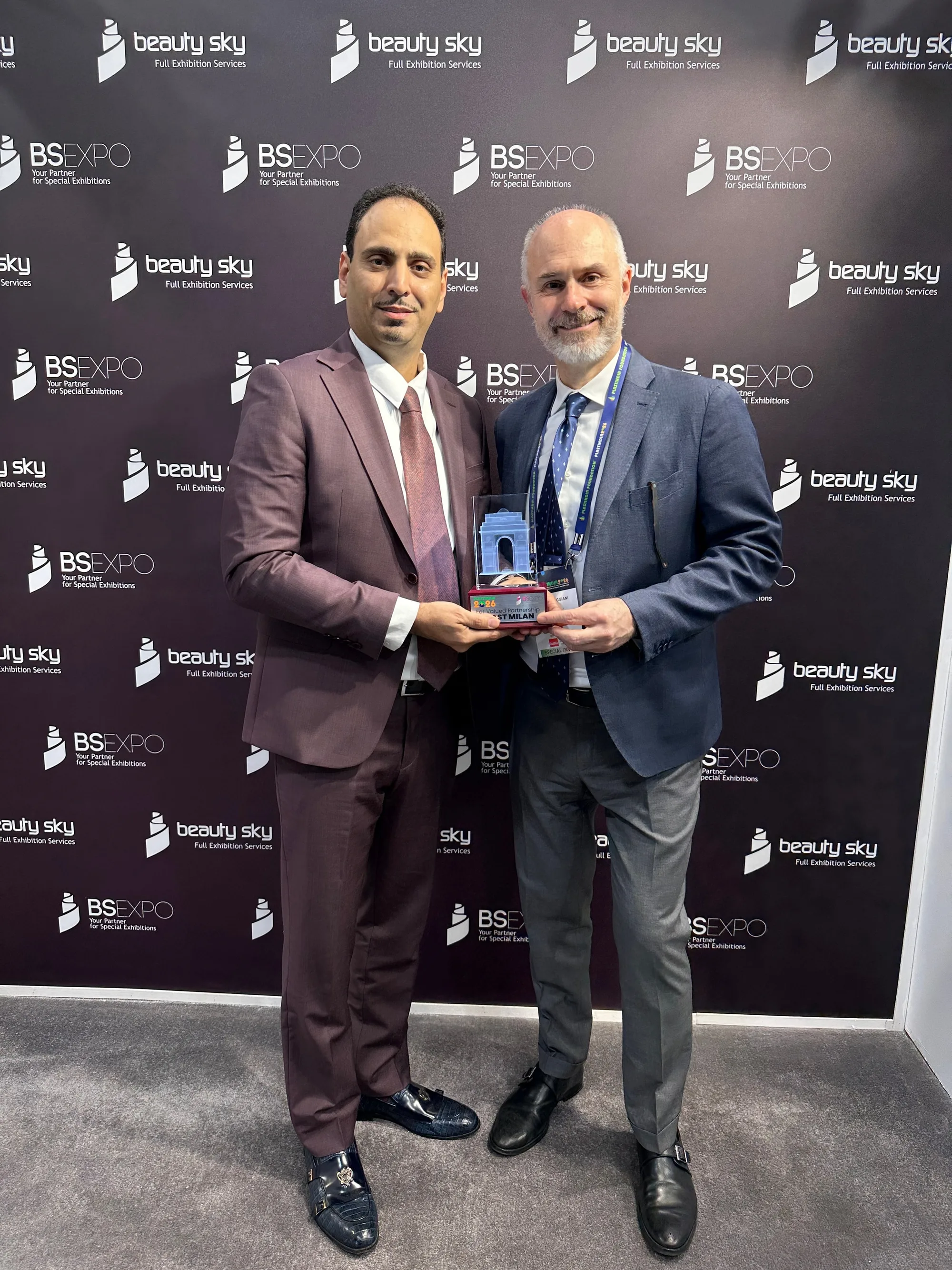 Beauty Sky presenting the For Valued Partnership award to the organiser of Plast Milan
