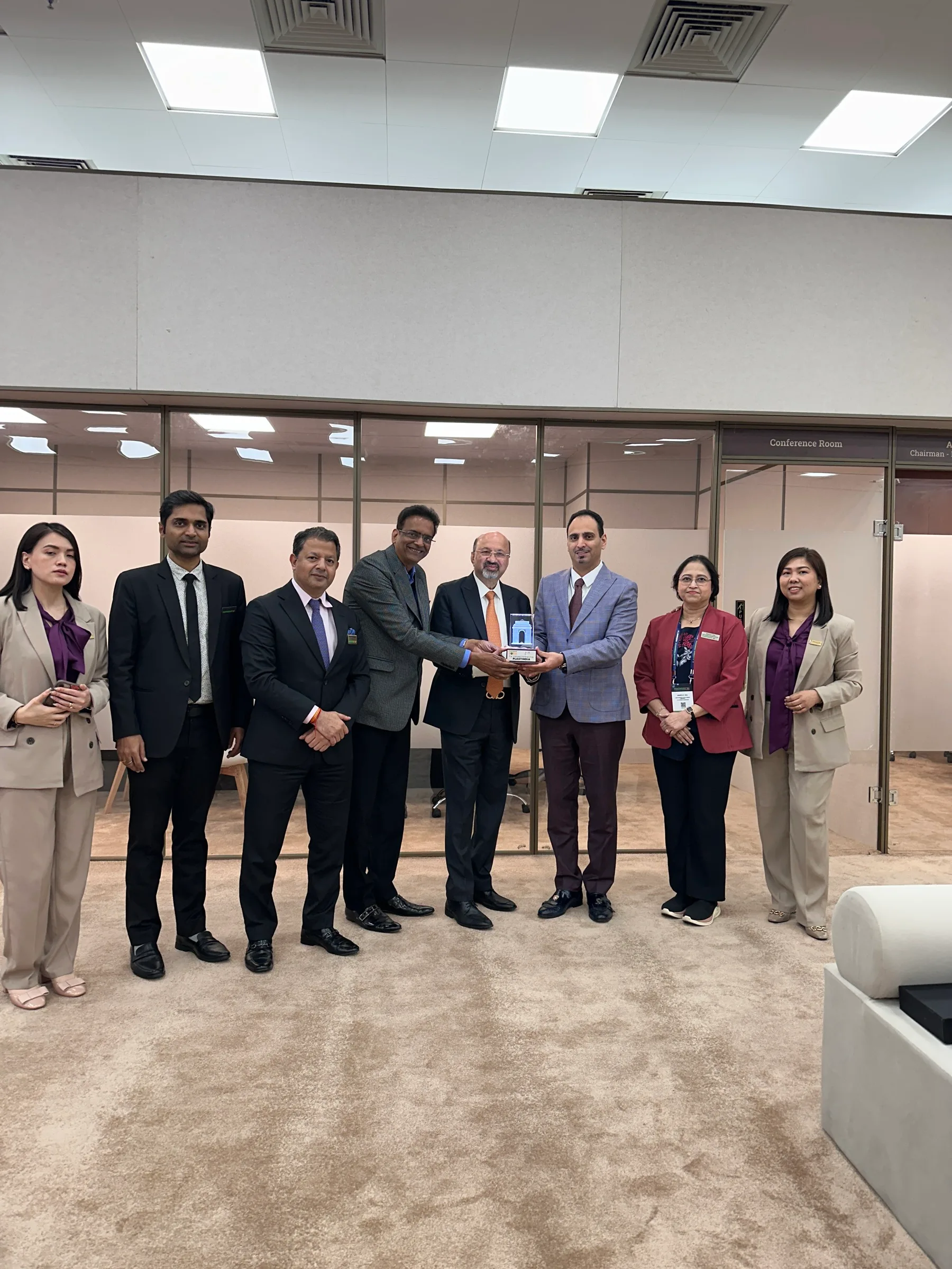 Beauty Sky with the PlastIndia team and partnership trophy